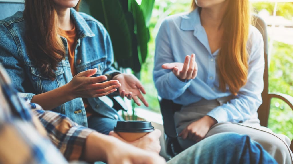 A group of young people talking together